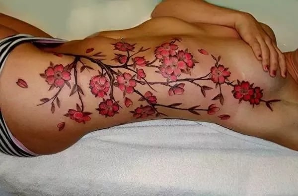 Full body floral Side belly tattoo idea for girls