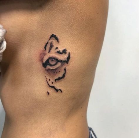 animal eye for side belly tattoo for girls