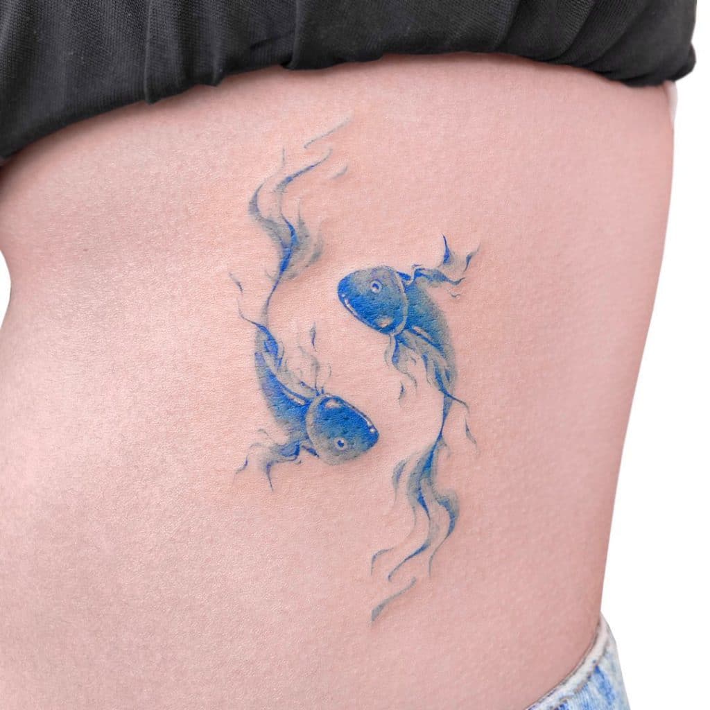 fish for side belly tattoo for girls