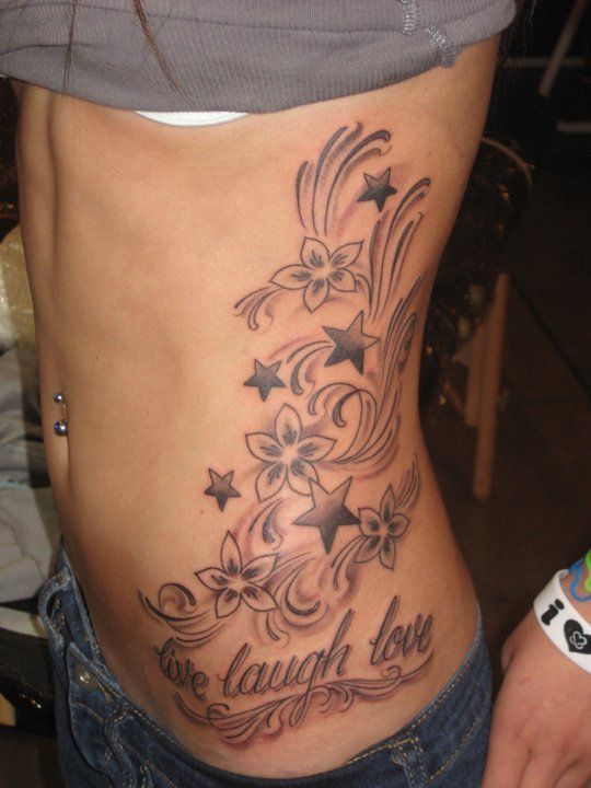 live, lough, love with flowers design side belly tattoo for girls