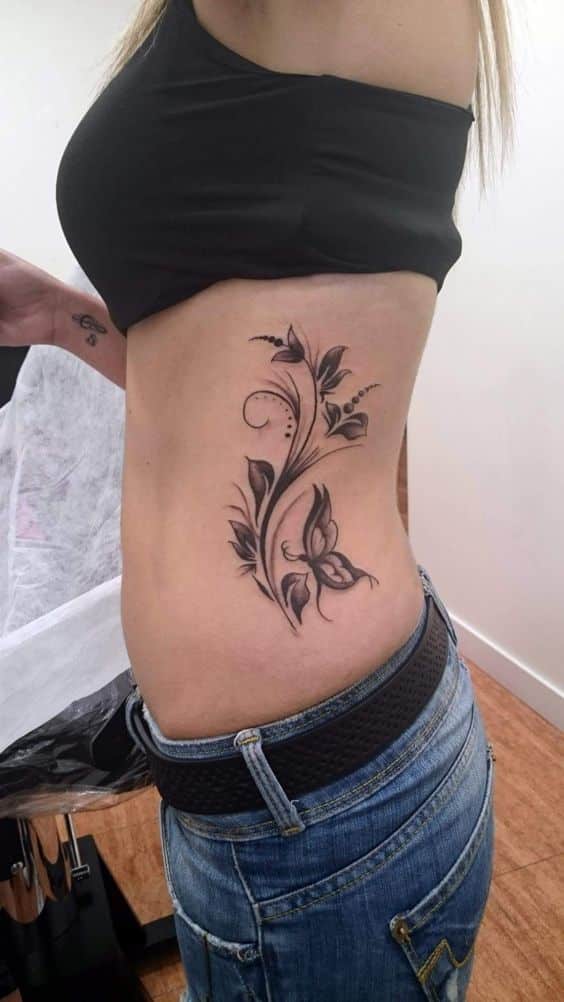 flower & butterfly side belly tattoo for girls