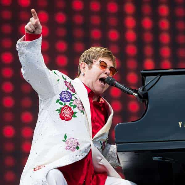 Elton John White Floral Outfit with Red Shirt