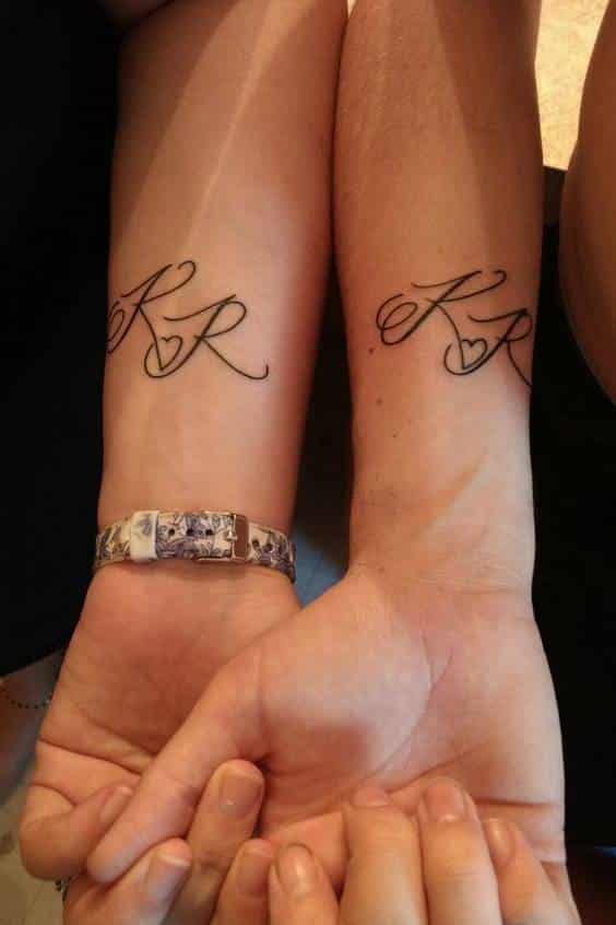 Initials couples tattoo