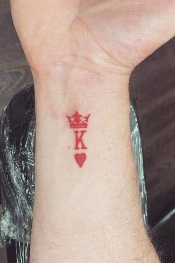 Unique King Initial Tattoo