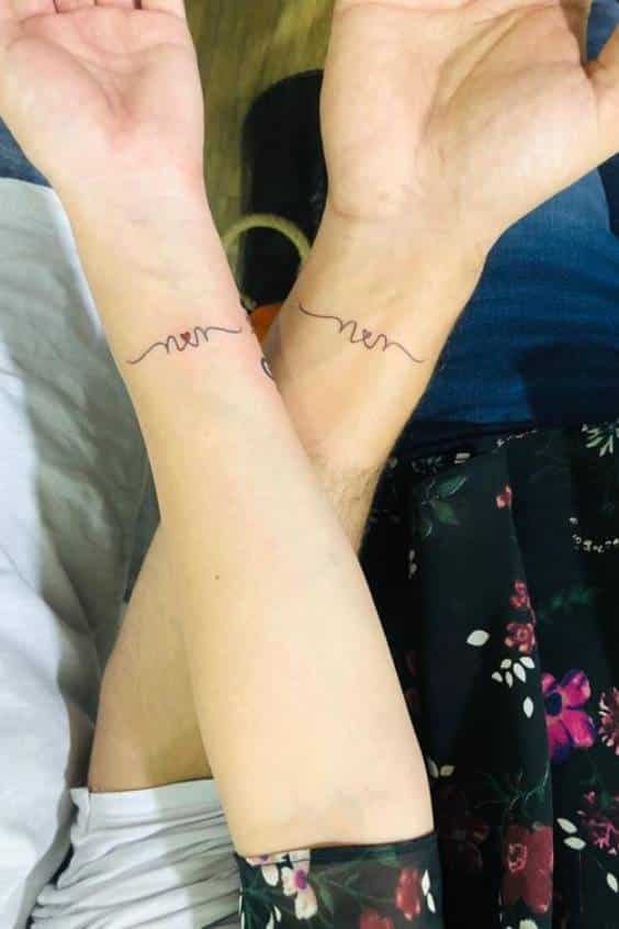 Couple N and N minimalist tattoo