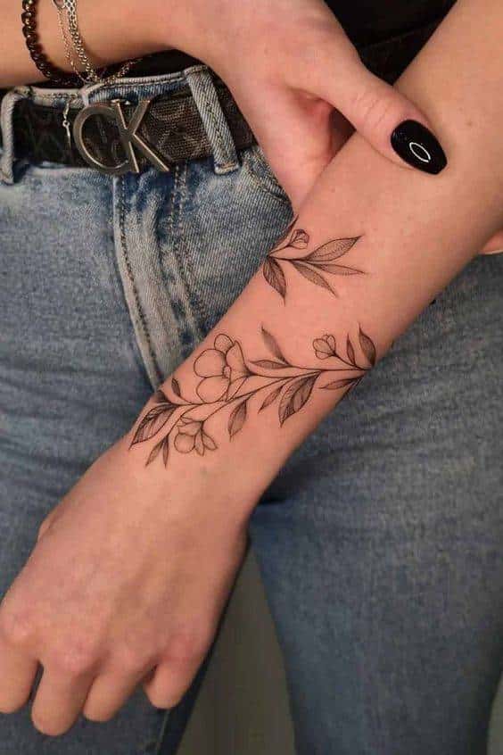 Elegant vine tattoo on the wrist