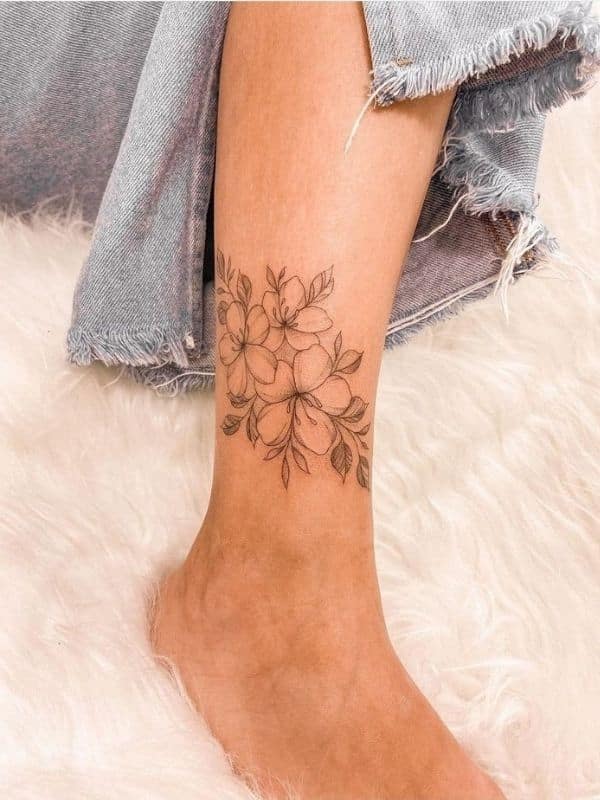 Ankle Covered with Floral Tattoo