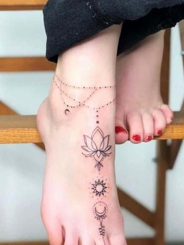 Geometric tattoo with sun moon and rose