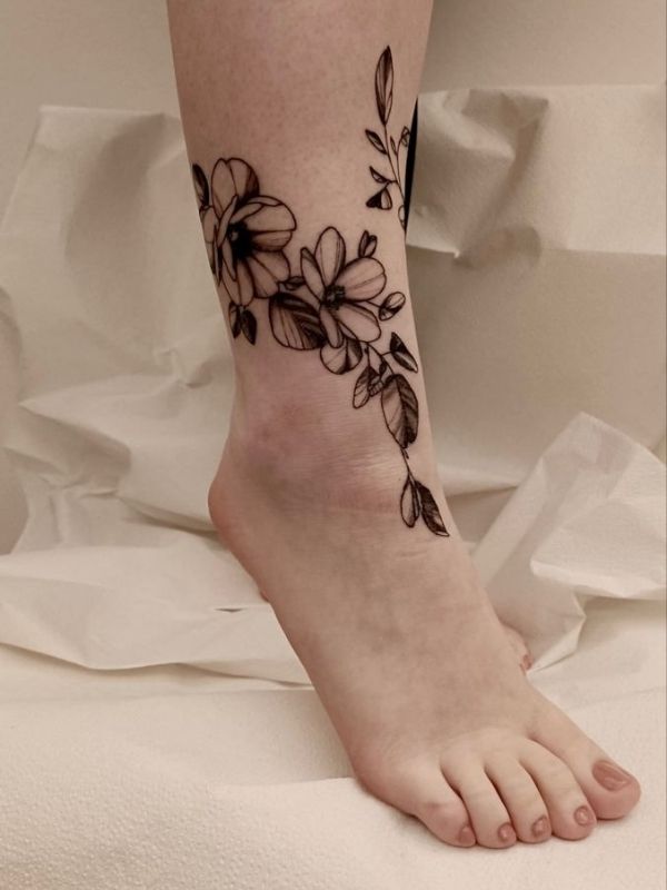 Sleek Floral Ankle Tattoo