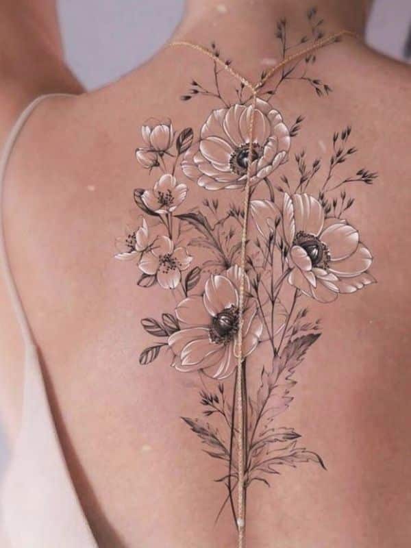 White and Black Floral Back Tattoos