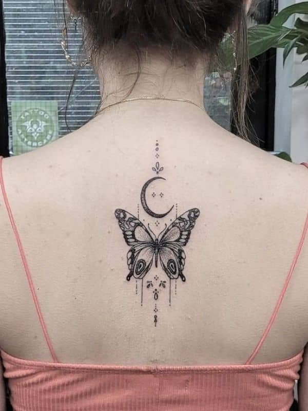 Butterfly with Moon on Spine Back Tattoo