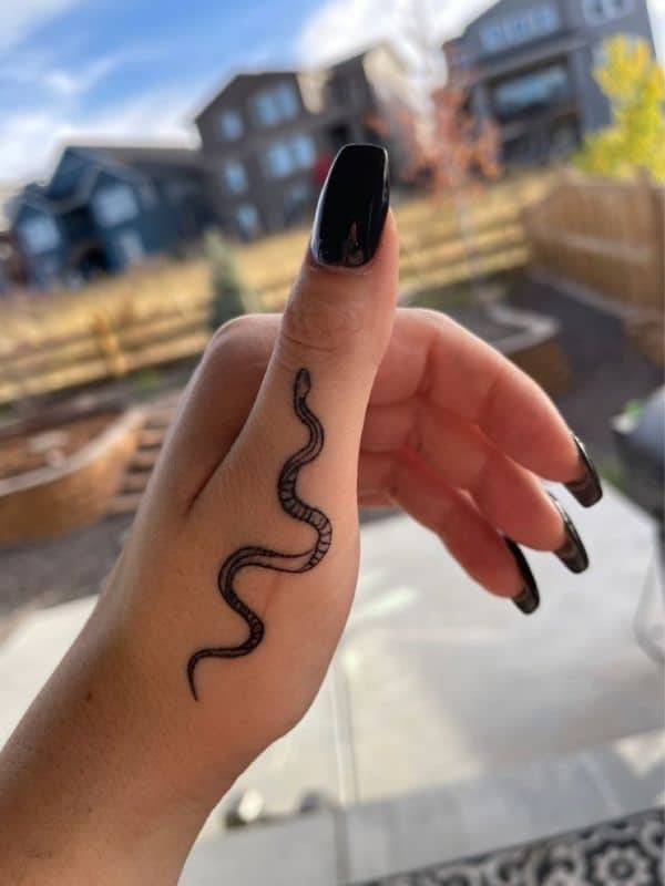 Snake Tattoos on Thumb