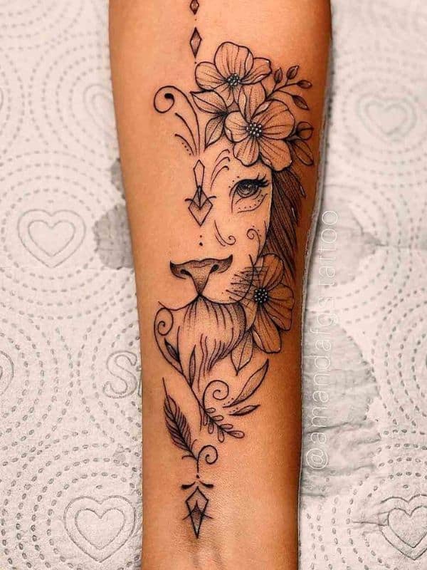 Floral and Half Face Lion Tattoo on Arm