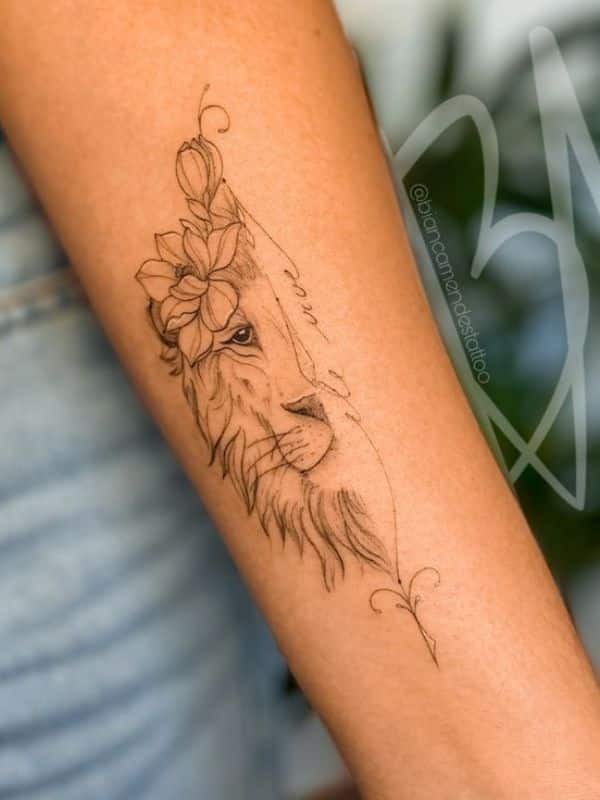 Half Face Lion Tattoo on Arm