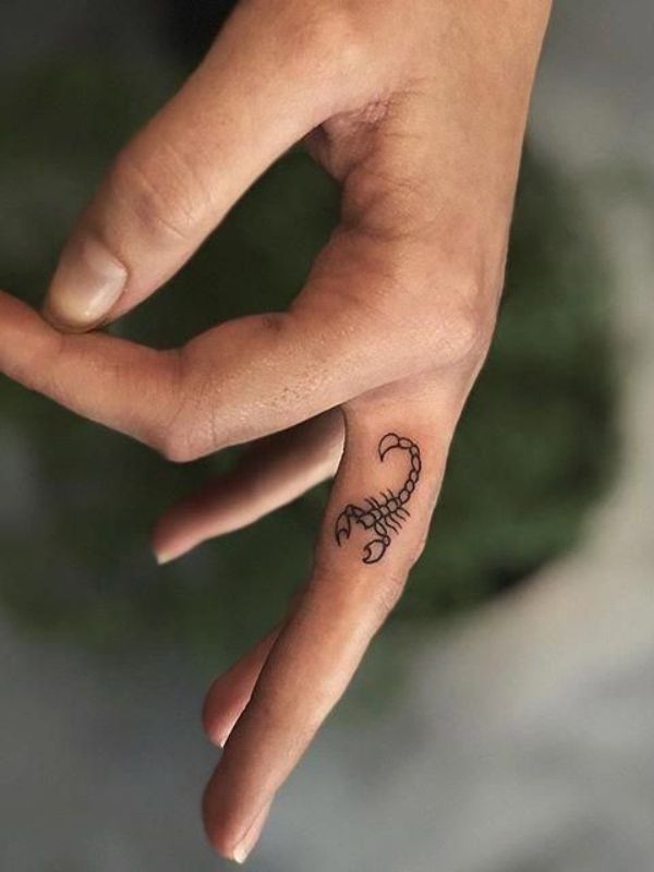 Scorpion Tattoo on Middle Finger