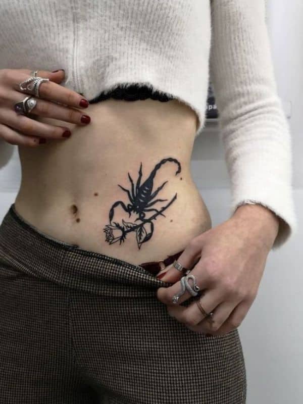 Rose and Scorpion Tattoo on Belly