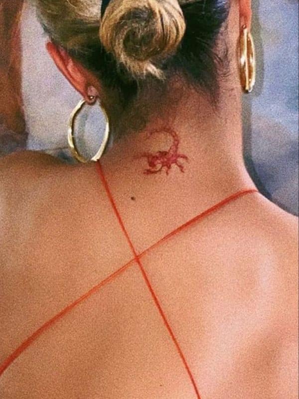 Red Scorpion Tattoo on Back Neck